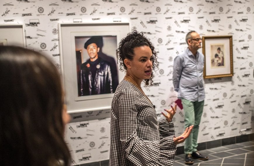 Sadie Barnette giving her artist's talk at the opening