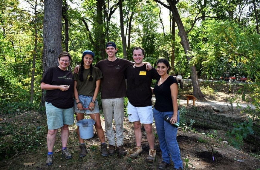 Arboretum Director Claudia Kent (left) and volunteers at the planting event.