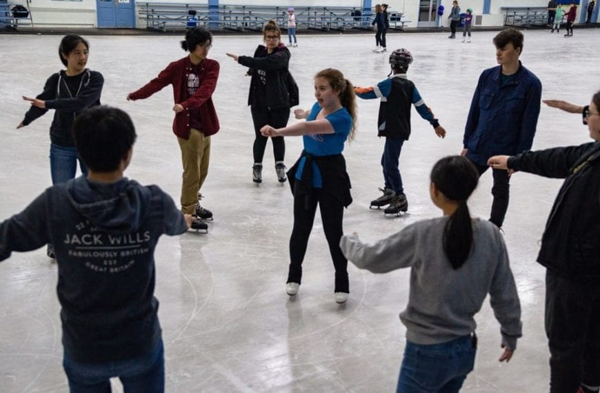 Anna Fiscarelli-Mintz '22 teaching members of the Figure Skating Club some tricks.