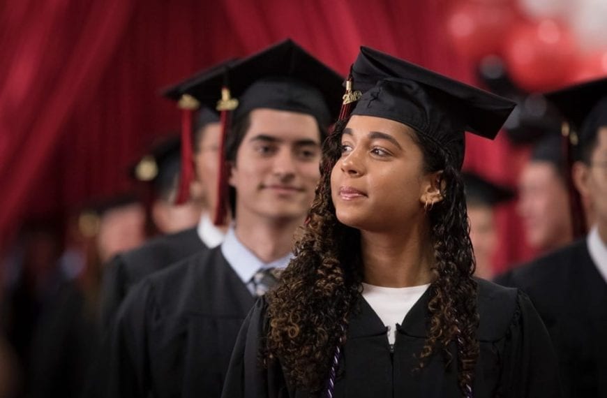 Students rising to get their degrees