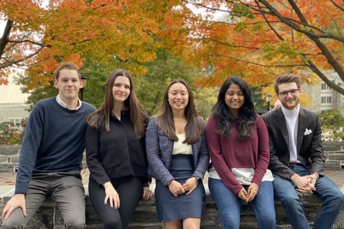The club's leadership team poses in business casual dress