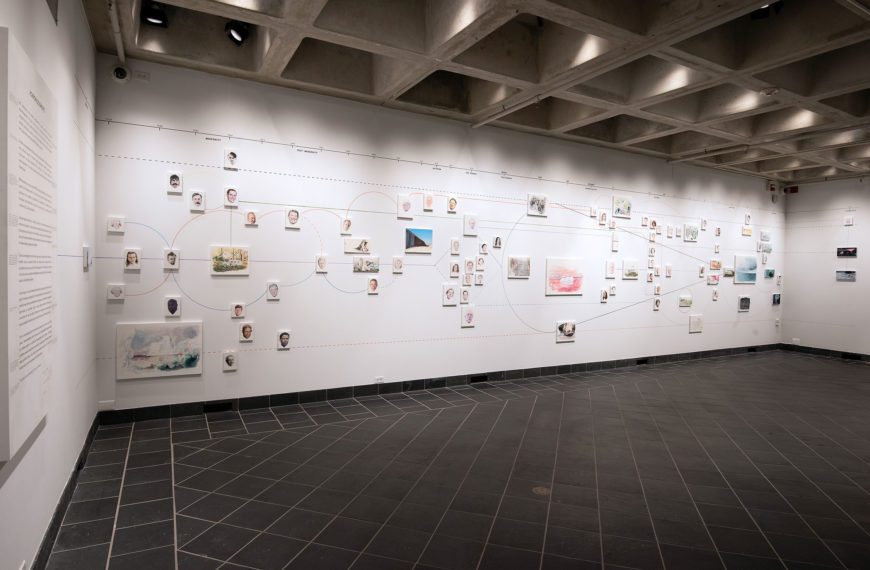 A massive, multi-wall installation of intersecting timelines and portraits showing the political lines of the country from the past into the future.