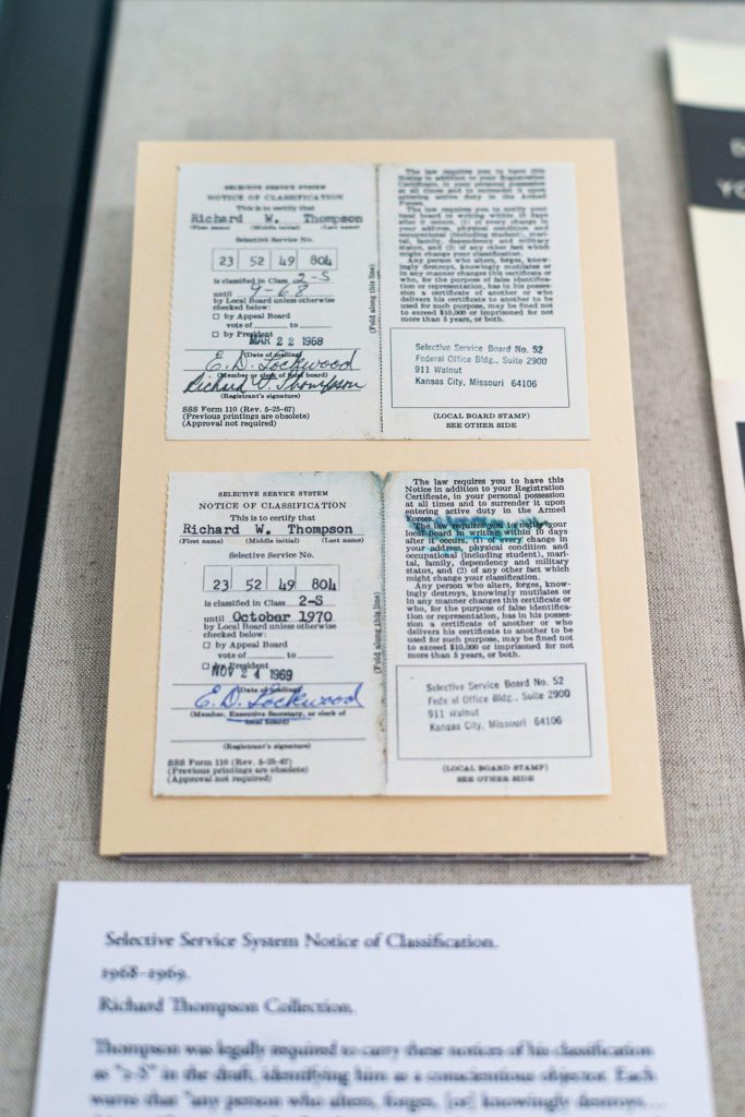 Two different selective service notices of classification signed by Thompson.