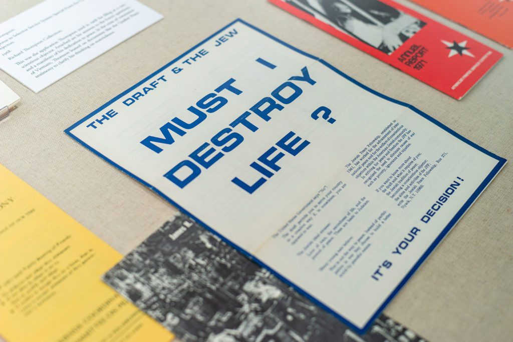 Several draft pamphlets including a large poster that reads "The Draft & The Jew: Must I Destroy Life?"