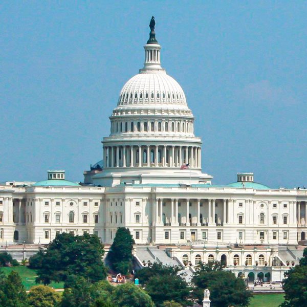 The U.S. capital building photographed against a bright blue sky