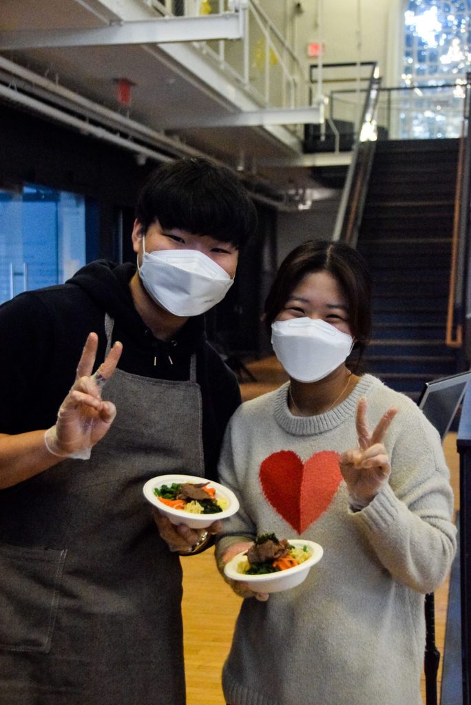 Yehyun Song '25 and Heewon Part '25 pose with their bibimbap.