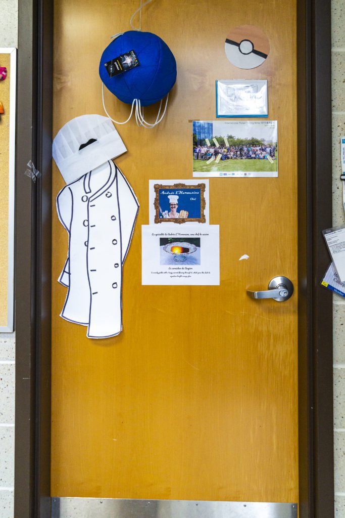 Karen Master's office door is festooned with a chef's coat and hat