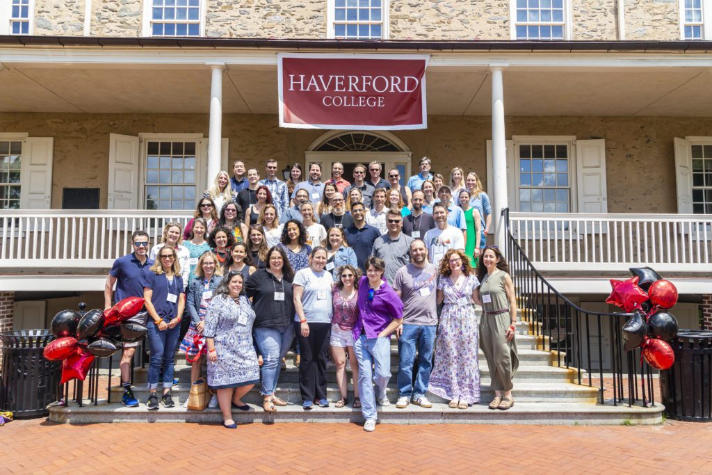 About 50 members of the 25th reunion class fill the stairs of Founders Hall for their portrait.