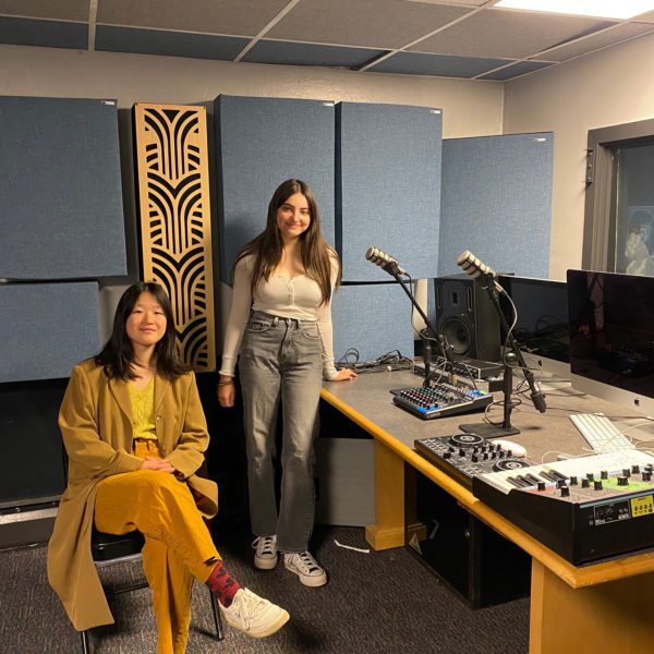 Natalie White '23 and Sarah Mastrocola '23 stand in the Haverford radio studio.