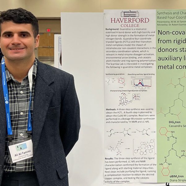 Ali Altamimi '22 stands in front of his poster at the Central Regional Meeting of the American Chemical Society.