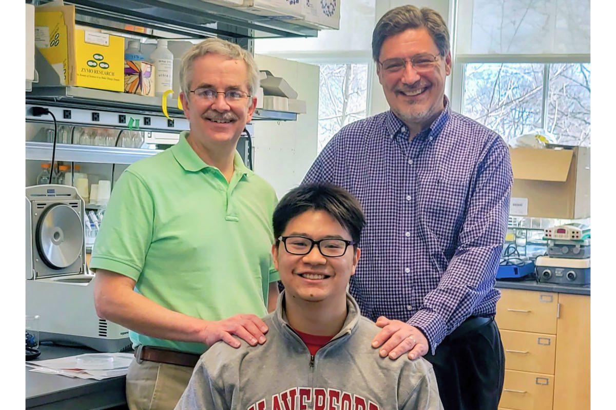 Junior, Rob, and Karl smile for the camera