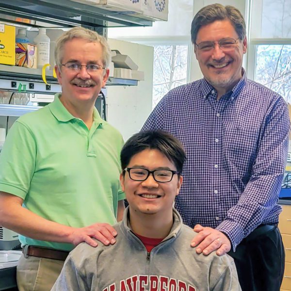 Junior, Rob, and Karl smile for the camera