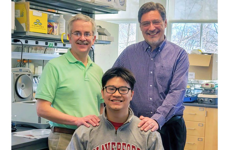 Junior, Rob, and Karl smile for the camera