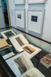 Photo of display case of David Freese's photography books and other related photography books. Photo by Patrick Montero.