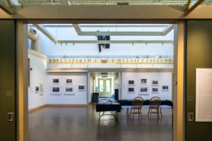 Photo of two walls displaying David Freese's photographs. Photo by Patrick Montero.