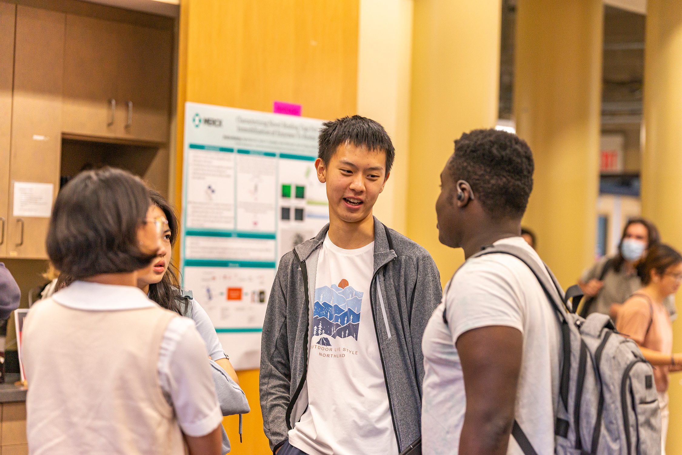 Students talk in Zubrow Commons during the Undergraduate Science Research Symposium. Photo by Patrick Montero.