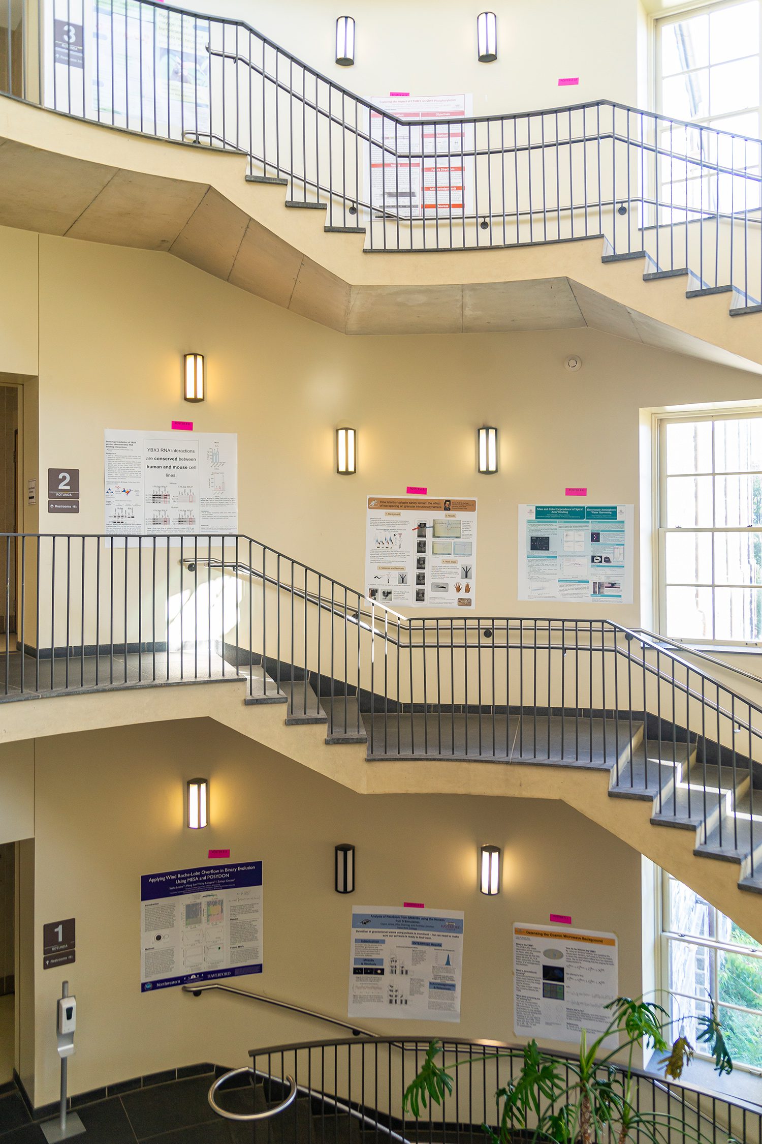 Photo of the KINSC Rotunda, with posters hung on its walls. Photo by Patrick Montero.