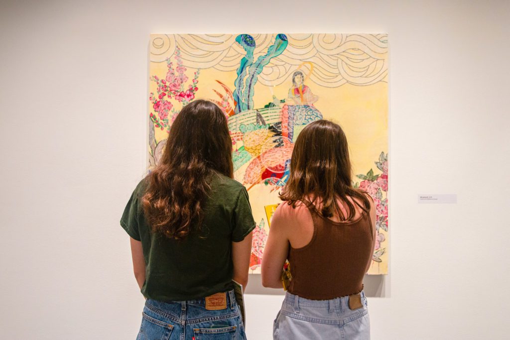 Students viewing Professor Kim's work. Photo by Alexandra Iglesia '21.
