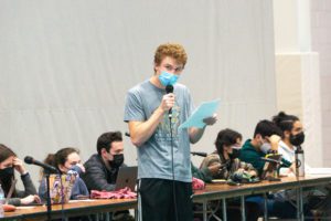 Nicholas Lasinsky '23 presents his resolution about plenary voting reform. Photo by Abigail Trapp '26.