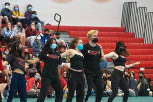Members of Bounce performing in front of the student body in the GIAC. Photo by Abigail Trapp '26.