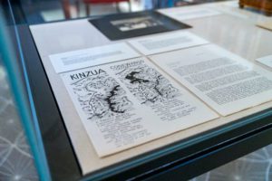 Flyers and letters from the 20th century sit on display as part of "In Perpetuity." Photo by Patrick Montero.