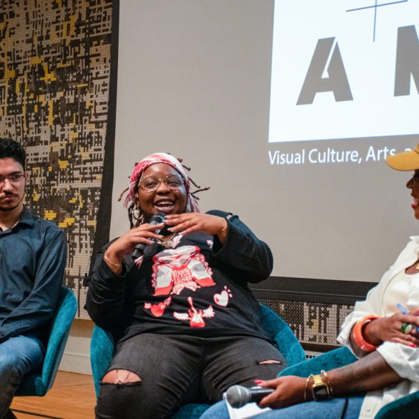 BL Shirelle sitting and talking with Naren Roy '23 and Stephanie D. Keene at the event.