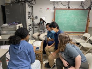Four students using the 40ft telescope at Green Bank Observatory