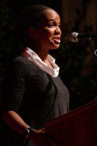 Imani Perry speaking at the microphone.