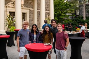 Students pose at the reception for the Imani Perry talk.