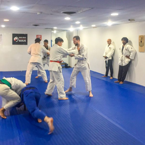 People practice judo in pairs at Main Line Judo, at a Judo Club meeting. Photo by Joseph Gentile '23.
