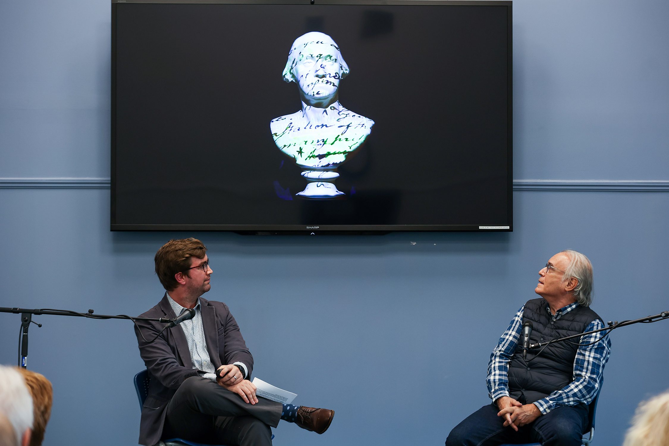 Christopher Green and Alan Michelson talk about "Native America: In Translation" as part of the exhibit's opening event. Photo by Paola Nogueras.