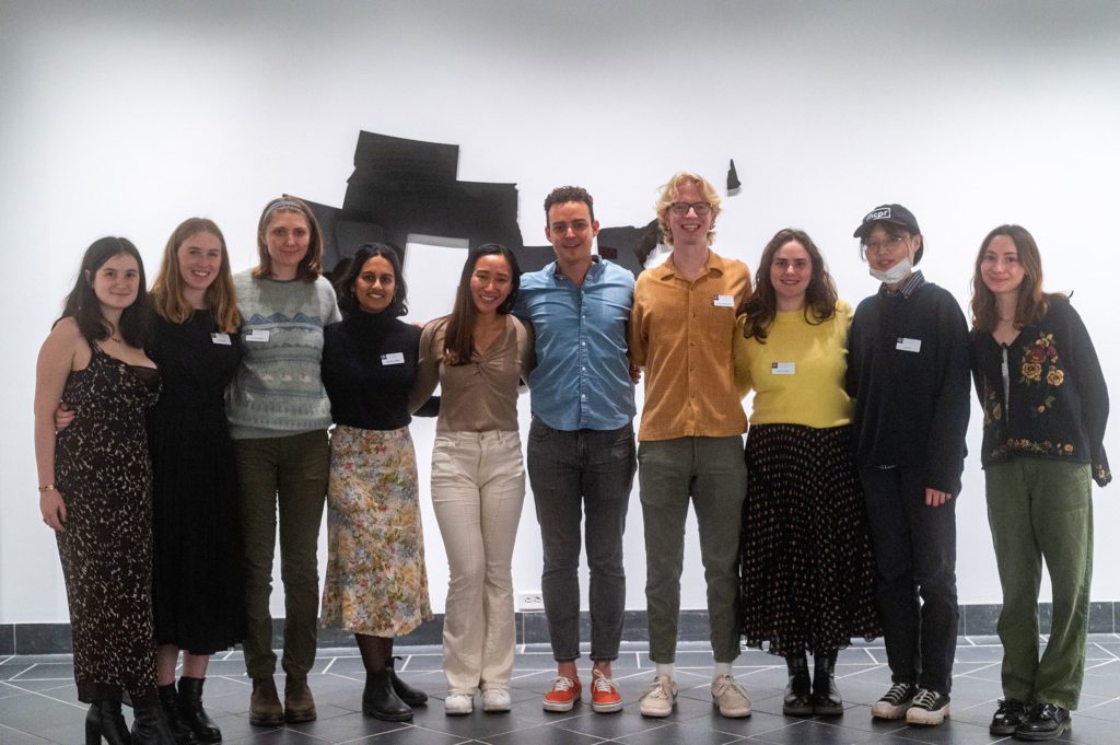 Artist Mark Menjívar with the student gallery assistants. Photo by Logan de Raspide Ross '23.