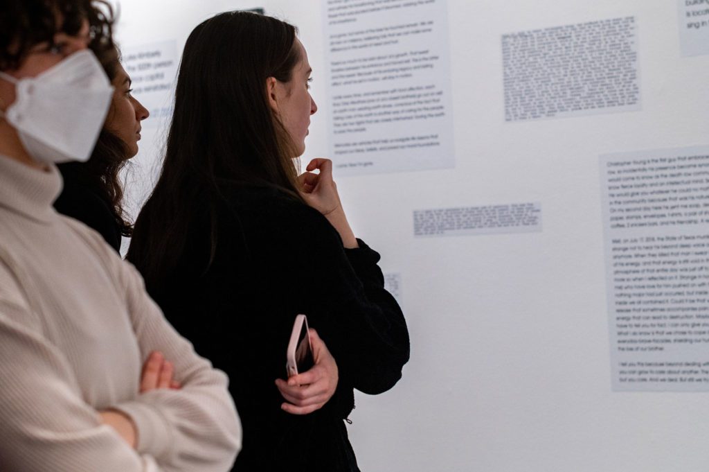 Attendees reading personal accounts from "An Incomplete and Expanded Timeline of Capital Punishment in the United States.” Photo by Logan de Raspide Ross '23.