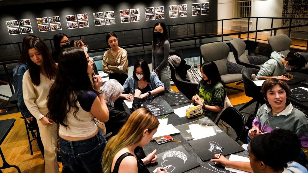 Students create works of art in response to Gulliver's questions and discussion. Photo by Reesha Gandhi '24.