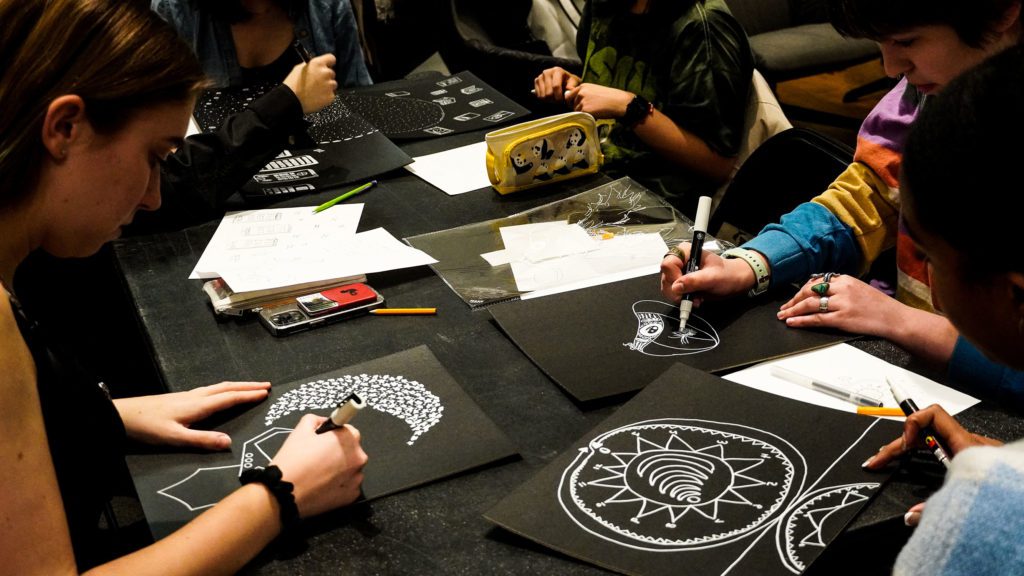 Students create works of art in response to Gulliver's questions and discussion. Photo by Reesha Gandhi '24.