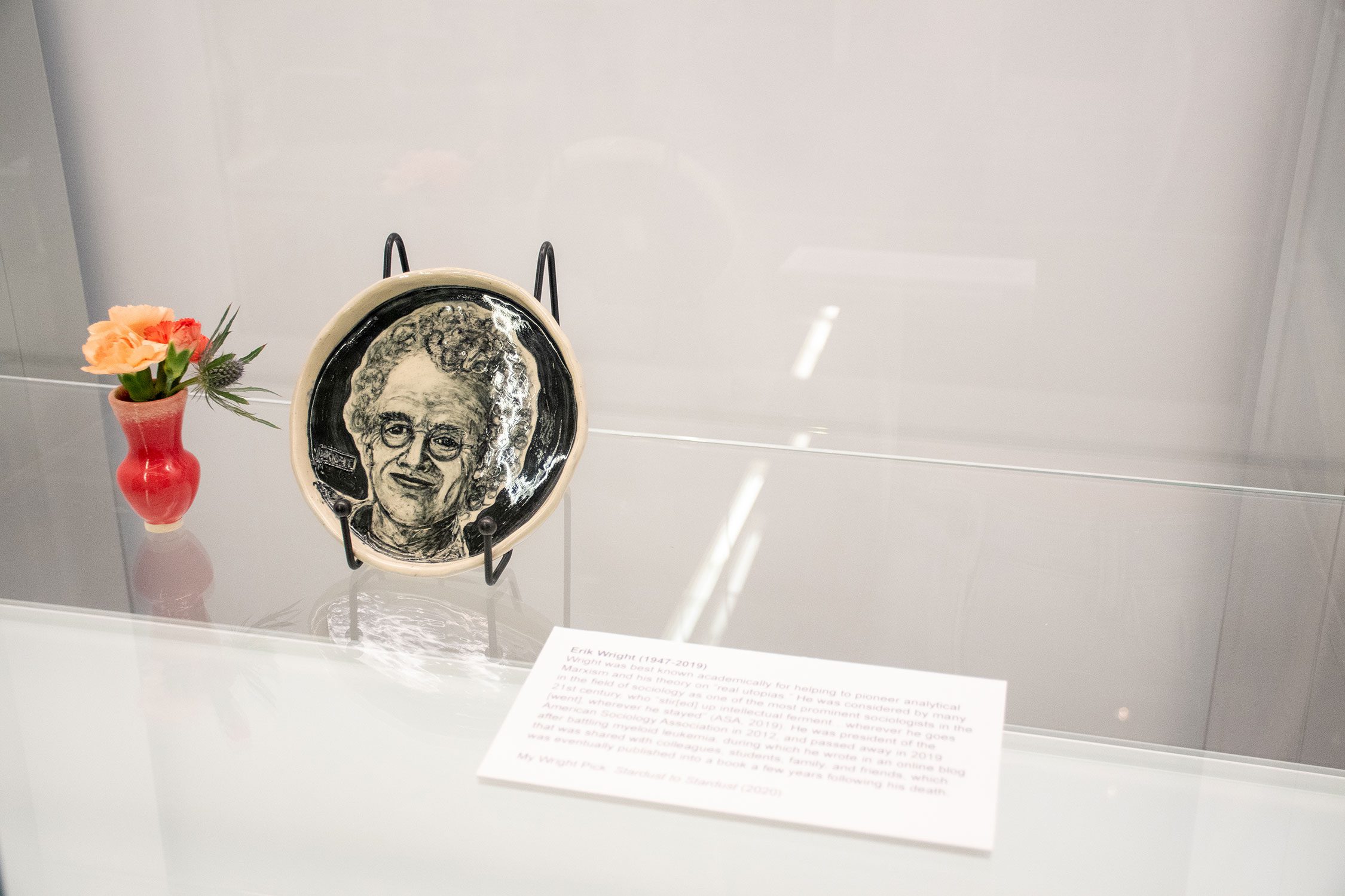 A ceramic plate portrait of Erik Wright. Photo by Jessica Korgen '24.