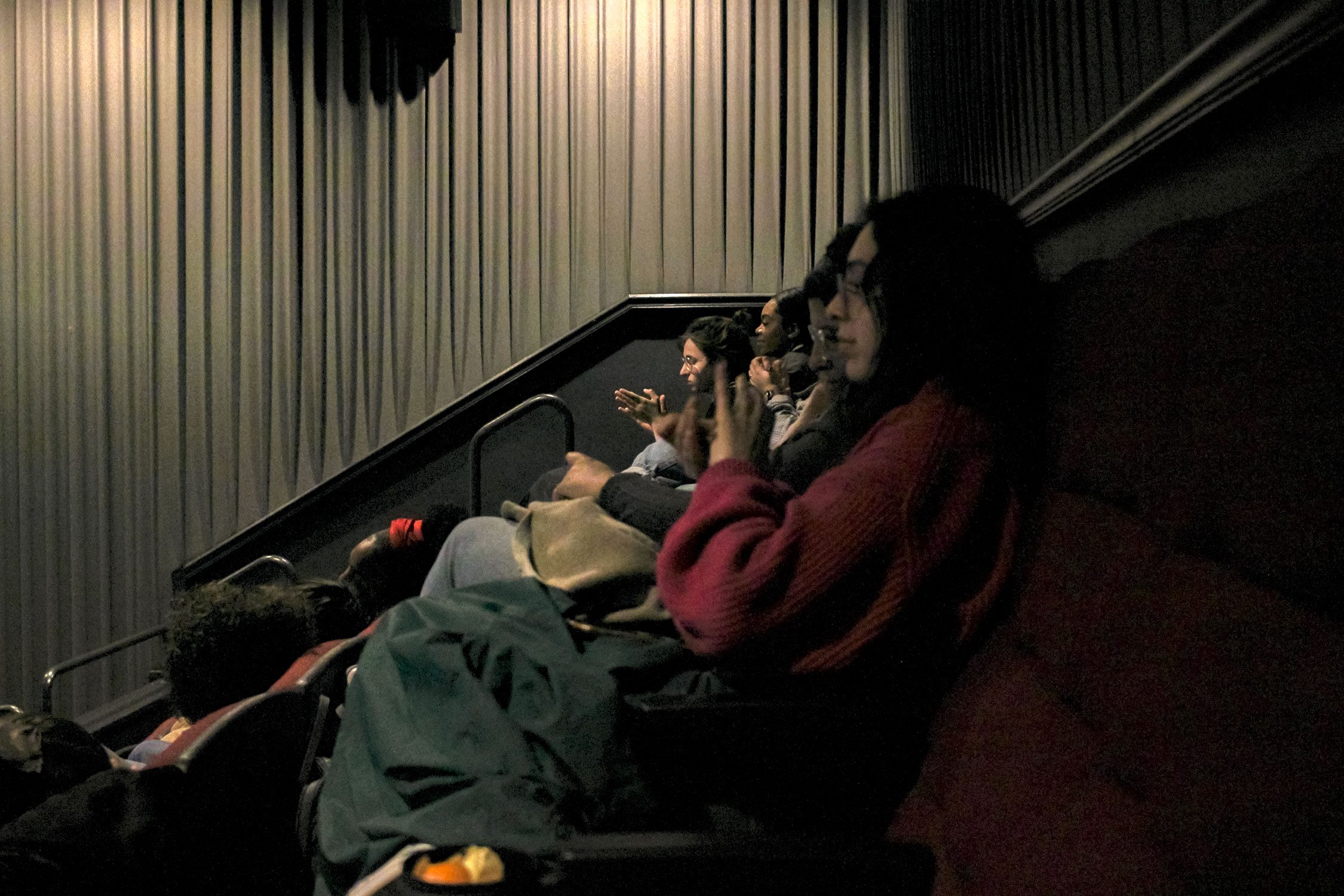 Attendees applaud for the film and for composer Robert Aiki Aubery Lowe. Photo by Anna Braun '26.