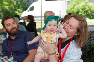 woman and a baby smiling