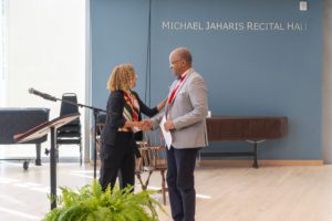 a man and a woman shaking hands