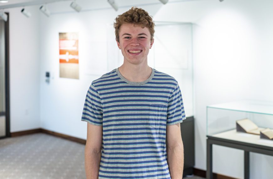 Portrait of Nicholas Lasinsky '23, curator of The Hundred Tongues of Rumour exhibition on display in the Rebecca and Rick White Gallery. Photo by Patrick Montero
