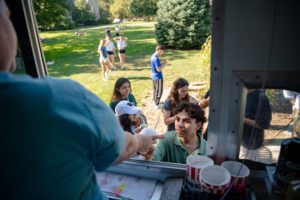Students getting a cool treat from food truck_photo by Holden Blanco '17