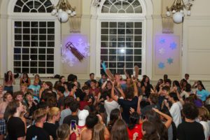 Large group of students dancing__photo by Paola Nogueras